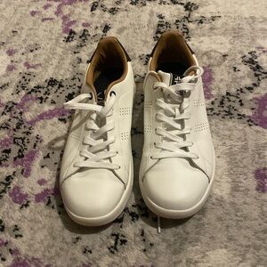 Like new Kuru white sneakers. Only worn once. Size women’s 10 medium.